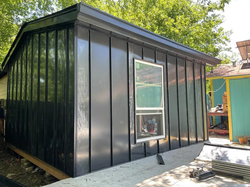 Black standing seam metal wall panels for Roof Inspection in Redland